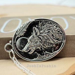 Handmade silver howling wolf pendant necklace